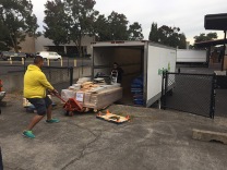 Unloading the production truck at Buck Studio's parking lot
